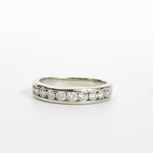 WHITE GOLD CHANNEL SET DIAMOND BAND