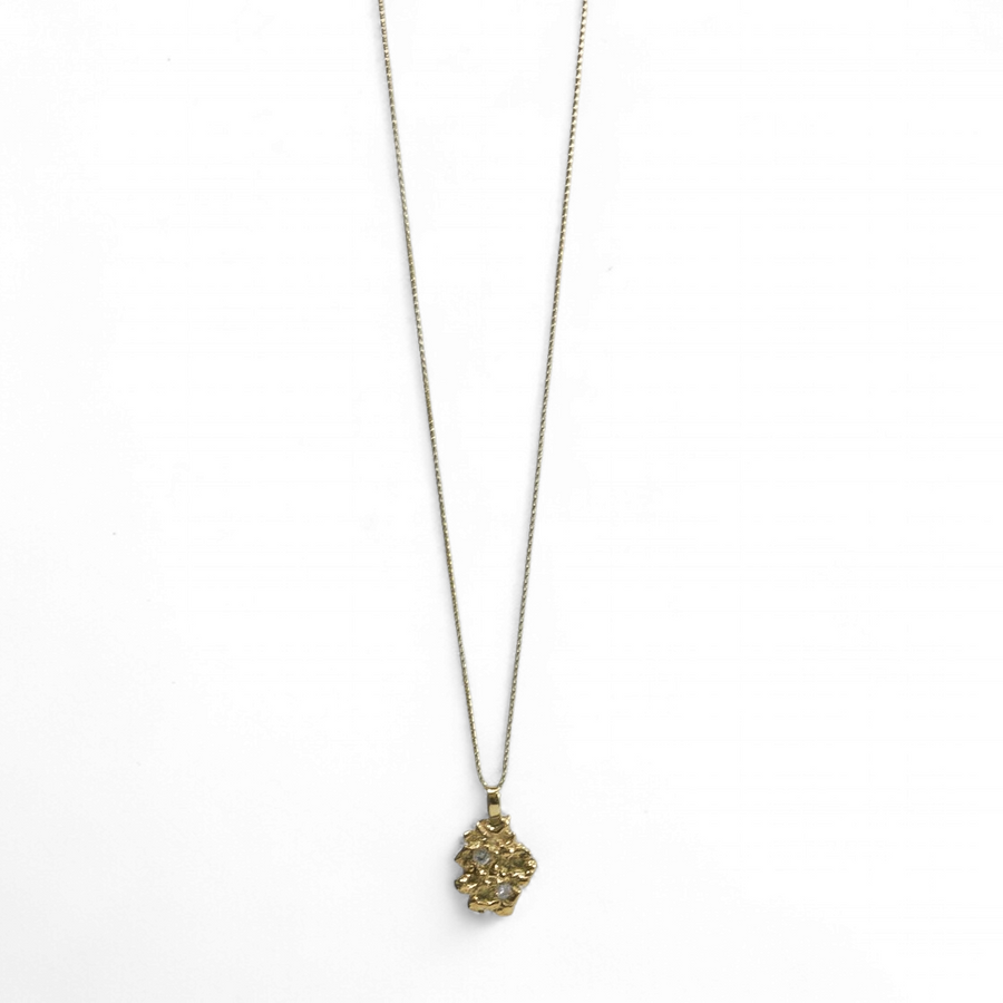 YELLOW GOLD NUGGET PENDANT WITH NATURAL DIAMONDS.