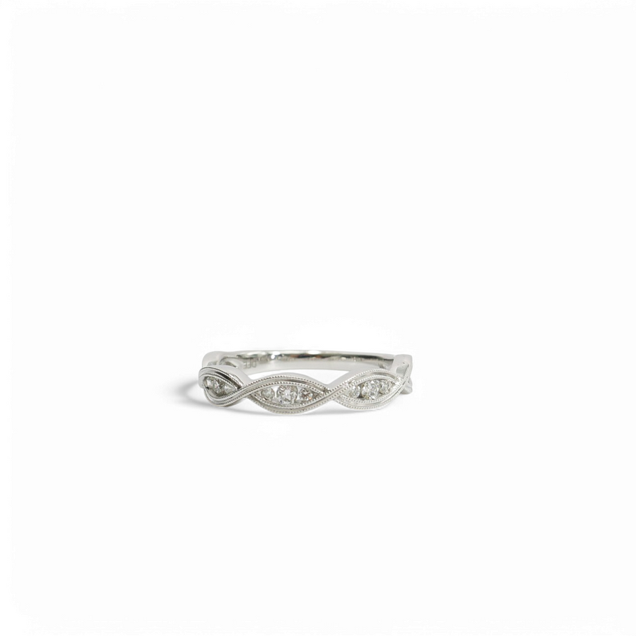 WHITE GOLD INFINITY BAND WITH NATURAL DIAMONDS.