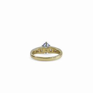YELLOW GOLD LADY'S RING WITH TANZANITE AND DIAMONDS